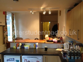 Kitchen with seating behind