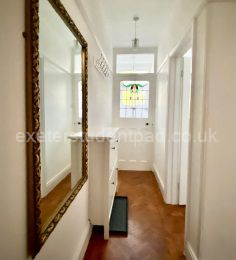 Hallway looking to front of house
