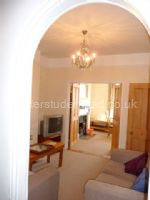 Sitting room looking into ground floor bedroom