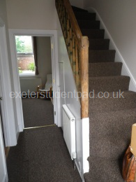 Stairs into Living room/diner/kitchen